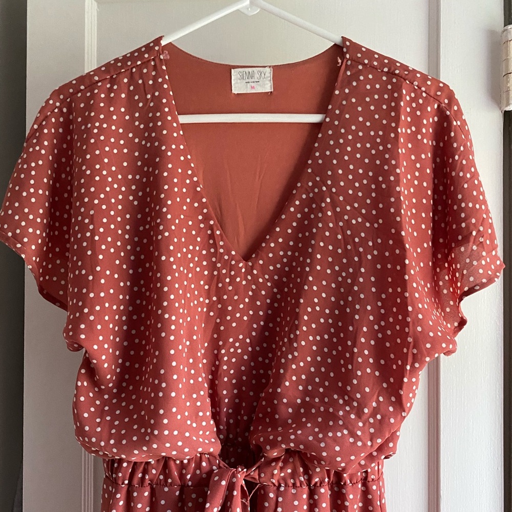 Pink and white polka dot midi dress with tie waist